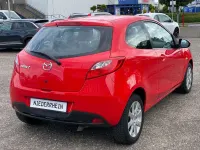 Używany Mazda 2 Inclusive 68 KM (50 kW) 2009 Czerwony Hatchback