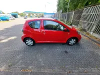 Gebraucht Toyota Aygo 68 PS (50 kW) 2009 Rot Kleinwagen