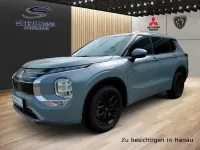 Gebraucht Mitsubishi Outlander P-HEV Top 136 PS (100 kW) 2025 Mondstein grau (metallic) SUV