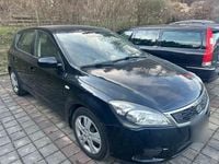 Second-hand Kia Ceed 90 CP (66 kW) 2011 Negru Hatchback