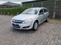 Używany Opel Astra 115 KM (84 kW) 2009 Purpurowy Kombi