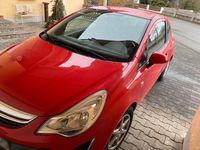 Gebraucht Opel Corsa 69 PS (50 kW) 2012 Rot Kleinwagen