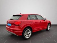 Gebraucht Audi Q2 Comfort 150 PS (110 kW) 2017 Tangorot metallic (metallic) SUV