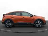 Second-hand Citroën e-C4 Shine 100 kW (136 CP) 2022 Portocaliu Berlinǎ