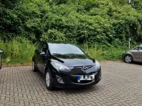 Gebraucht Mazda 2 Active 75 PS (55 kW) 2010 Schwarz Kleinwagen