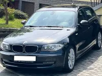 Używany BMW 116 122 KM (89 kW) 2009 Czarny Hatchback