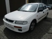Używany Mazda 323 88 KM (64 kW) 1996 Biały Sedan/Limuzyna