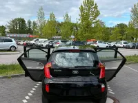 Gebraucht Kia Picanto 69 PS (50 kW) 2014 Schwarz Kleinwagen