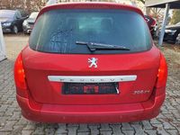 Gebraucht Peugeot 308 SW Premium 109 PS (80 kW) 2010 Rot Kombi