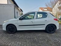 Gebraucht Peugeot 206+ 73 PS (53 kW) 2011 Weiß Kleinwagen