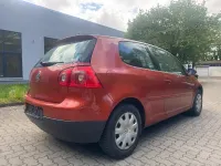 Używany VW Golf Goal 80 KM (58 kW) 2006 Pomarańczowy Coupe