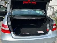 Używany Mercedes E250 204 KM (150 kW) 2010 Srebrny Sedan/Limuzyna