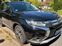 Używany Mitsubishi Outlander Top 150 KM (110 kW) 2016 Czarny SUV