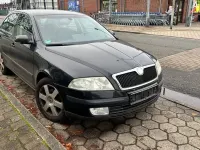 Używany Skoda Octavia Elegance 105 KM (77 kW) 2004 Czarny Sedan/Limuzyna