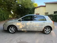 Używany Toyota Corolla 110 KM (80 kW) 2005 Srebrny Sedan/Limuzyna