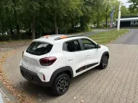 Gebraucht Dacia Spring Essentiel 33 kW (45 PS) 2023 Polarweiss (metallic) Kleinwagen