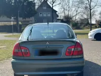 Gebraucht Mitsubishi Carisma 103 PS (75 kW) 2003 Grün Limousine
