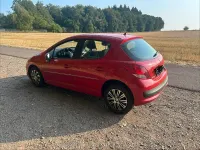 Gebraucht Peugeot 207 95 PS (69 kW) 2011 Rot Kleinwagen
