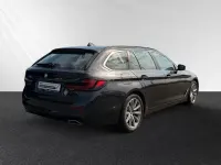 Gebraucht BMW 520 190 PS (139 kW) 2022 Sophistograu brillanteffekt metallic Kombi