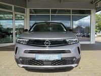 Gebraucht Opel Mokka 131 PS (96 kW) 2023 Kontrast grau/quarz silber SUV