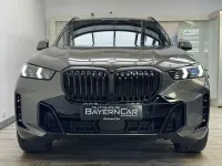 Gebraucht BMW X5 M Sport 298 PS (219 kW) 2025 (0c3d) manhattan green metallic SUV