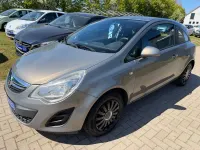 Gebraucht Opel Corsa Active 69 PS (50 kW) 2013 Braun Kleinwagen