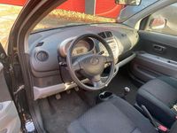 Gebraucht Daihatsu Sirion 69 PS (50 kW) 2007 Schwarz Kleinwagen