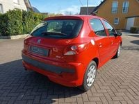 Gebraucht Peugeot 206 73 PS (53 kW) 2012 Rot Limousine