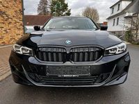 Gebraucht BMW 330e Sport Line 292 PS (214 kW) 2022 Schwarz ii/bonnet fluid black Kombi