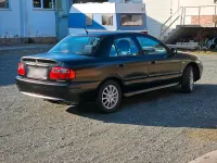 Gebraucht Mitsubishi Carisma 100 PS (73 kW) 2001 Schwarz Limousine