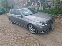 Second-hand Mercedes E250 150 CP (110 kW) 2009 Argintiu Berlinǎ