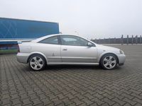 Second-hand Opel Astra 146 CP (107 kW) 2003 Argintiu Coupe