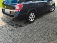 Używany Opel Astra Edition 116 KM (85 kW) 2010 Czarny Kombi