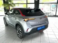 Gebraucht Opel Mokka 131 PS (96 kW) 2024 Lack grau artense/typ au... SUV