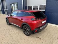 Gebraucht Peugeot e-2008 Allure 100 kW (136 PS) 2021 Elixir rot perlmutteffekt (metallic) SUV