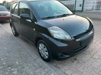 Gebraucht Daihatsu Sirion 70 PS (51 kW) 2010 Schwarz Kleinwagen