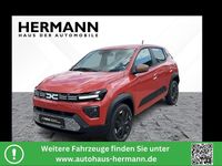 Gebraucht Dacia Spring Extreme 47 kW (65 PS) 2025 Brick red (rot) Kleinwagen