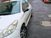 Gebraucht Peugeot 206+ 68 PS (50 kW) 2012 Weiß Kleinwagen