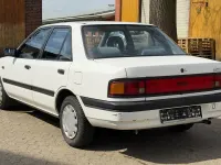 Usata Mazda 323 85 CV (62 kW) 1990 Bianco Berlina
