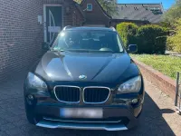 Second-hand BMW X1 148 CP (108 kW) 2011 Negru SUV