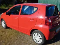 Gebraucht Nissan Pixo 68 PS (50 kW) 2009 Rot Kleinwagen