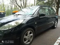 Gebraucht Peugeot 206+ 75 PS (55 kW) 2010 Schwarz Kleinwagen