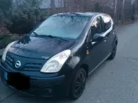 Gebraucht Nissan Pixo 68 PS (50 kW) 2010 Schwarz Kleinwagen