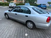 Gebraucht Mitsubishi Carisma 90 PS (66 kW) 1997 Grau Limousine
