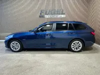 Gebraucht BMW 330e Advantage 2022 Phytonicblau metallic Kombi