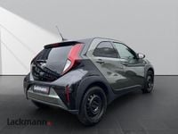 Gebraucht Toyota Aygo X Pulse 72 PS (52 kW) 2023 6w4)/ black mica (209) (gruen SUV