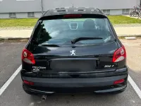 Gebraucht Peugeot 206 73 PS (53 kW) 2011 Schwarz Kleinwagen