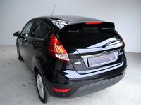 Gebraucht Ford Fiesta Titanium 125 PS (91 kW) 2017 Iridiumschwarz metallic Limousine