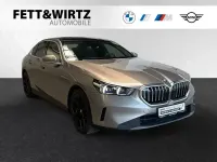 Gebraucht BMW 550e Comfort Edition 489 PS (359 kW) 2024 Oxidgrau metallic Limousine