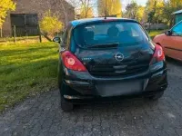 Second-hand Opel Corsa 59 CP (43 kW) 2008 Negru Hatchback